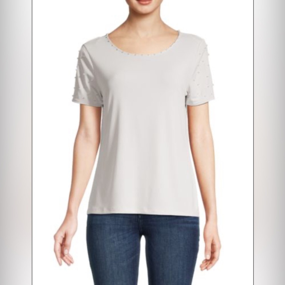 #19 Carmen Marc Valvo soft grey short sleeve top with pearl embellishment